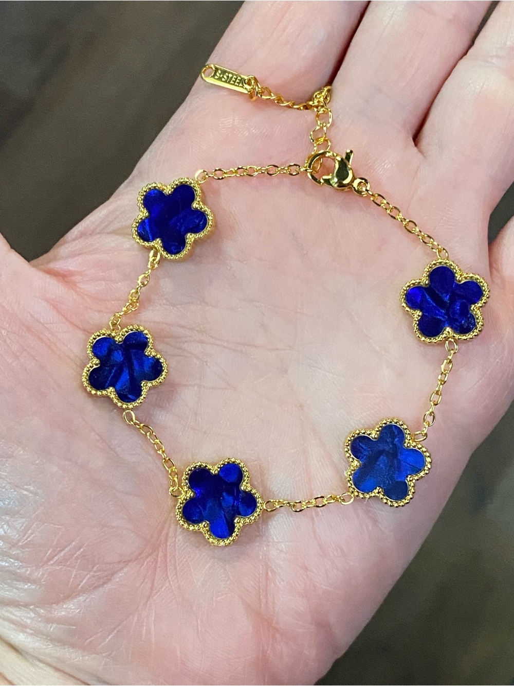 Gold-Tone Bracelet with Cobalt Blue Clover Accents
